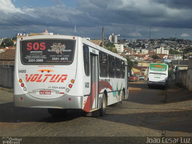 Voltur - Viação Oliveira Turismo 1400 na cidade de Oliveira, Minas Gerais, Brasil, por João César Luz. ID da foto: 4209951.