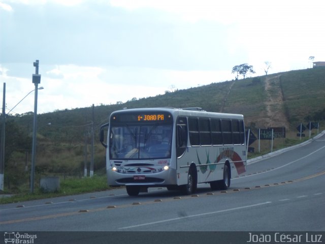 Voltur - Viação Oliveira Turismo 1100 na cidade de Oliveira, Minas Gerais, Brasil, por João César Luz. Número da foto: #4301797.